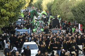 آئین نمادین ورود کاروان امام حسین(ع) به دشت کربلا_ همدان