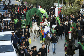 آئین نمادین ورود کاروان امام حسین(ع) به دشت کربلا_ همدان