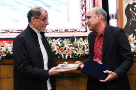 پدر کیمیا علیزاده و محمود خسروی‌وفا، رییس کمیته المپیک در ضیافت سده المپیک